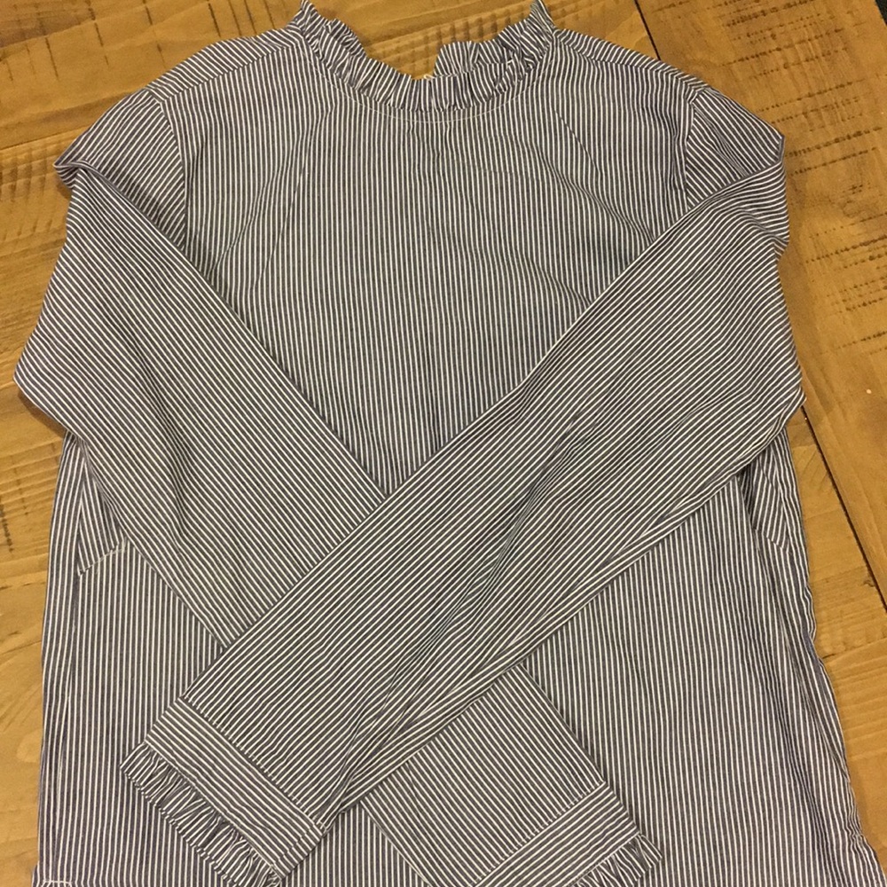 Blue and white striped blouse.